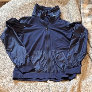 Women’s under armour thin zip up jacket. Size medium